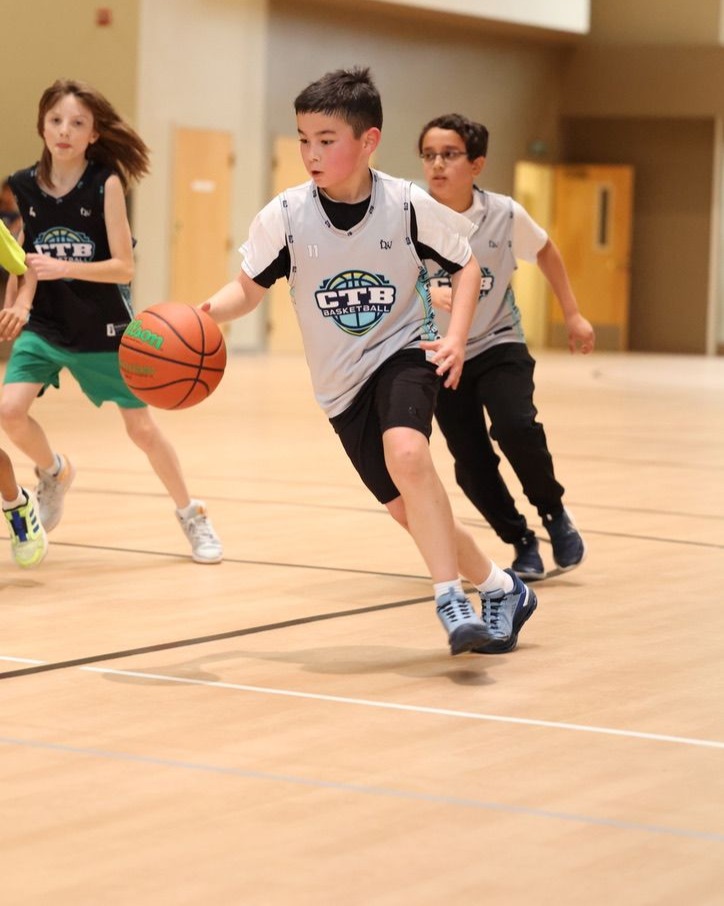 A boy playing basketball