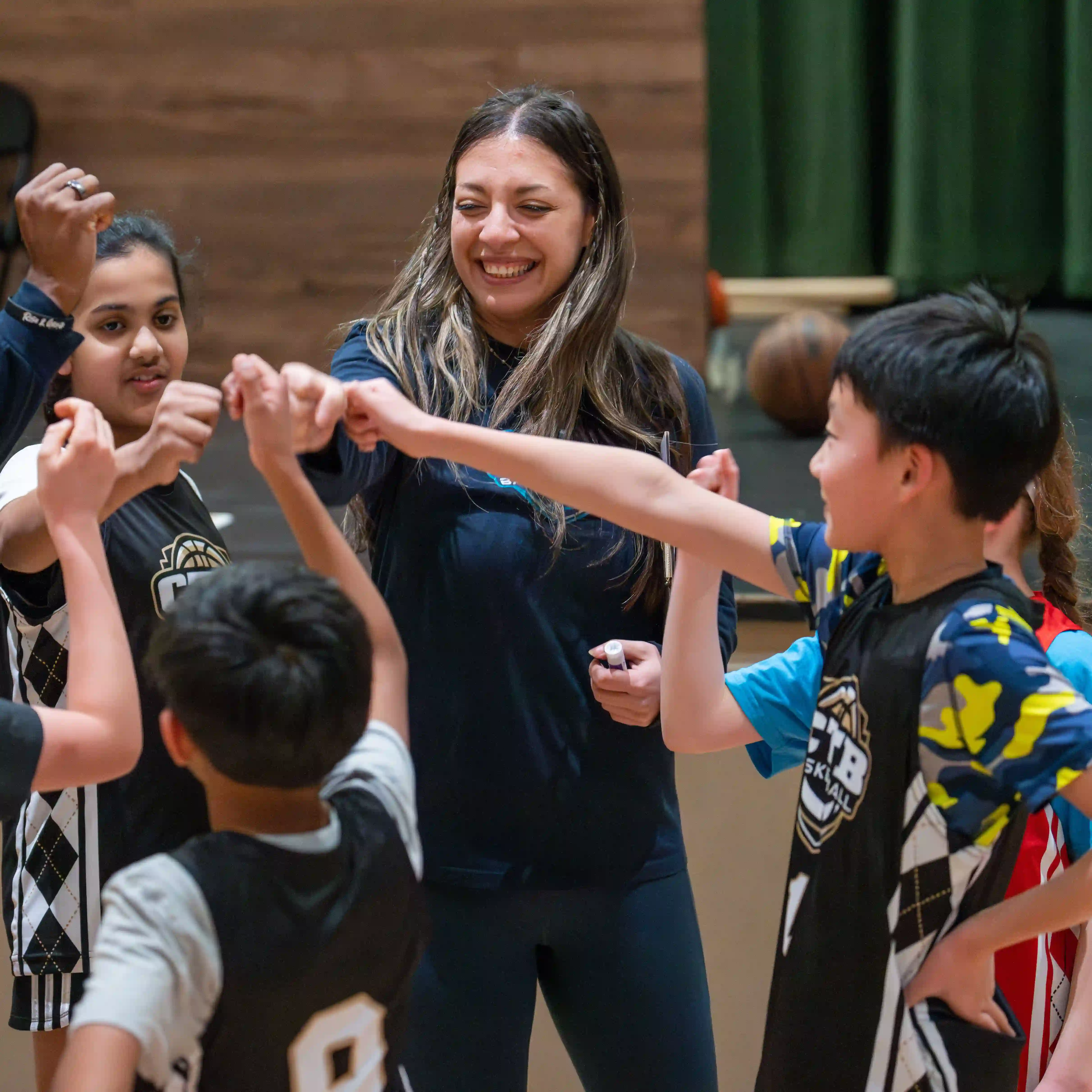 A coach and her team