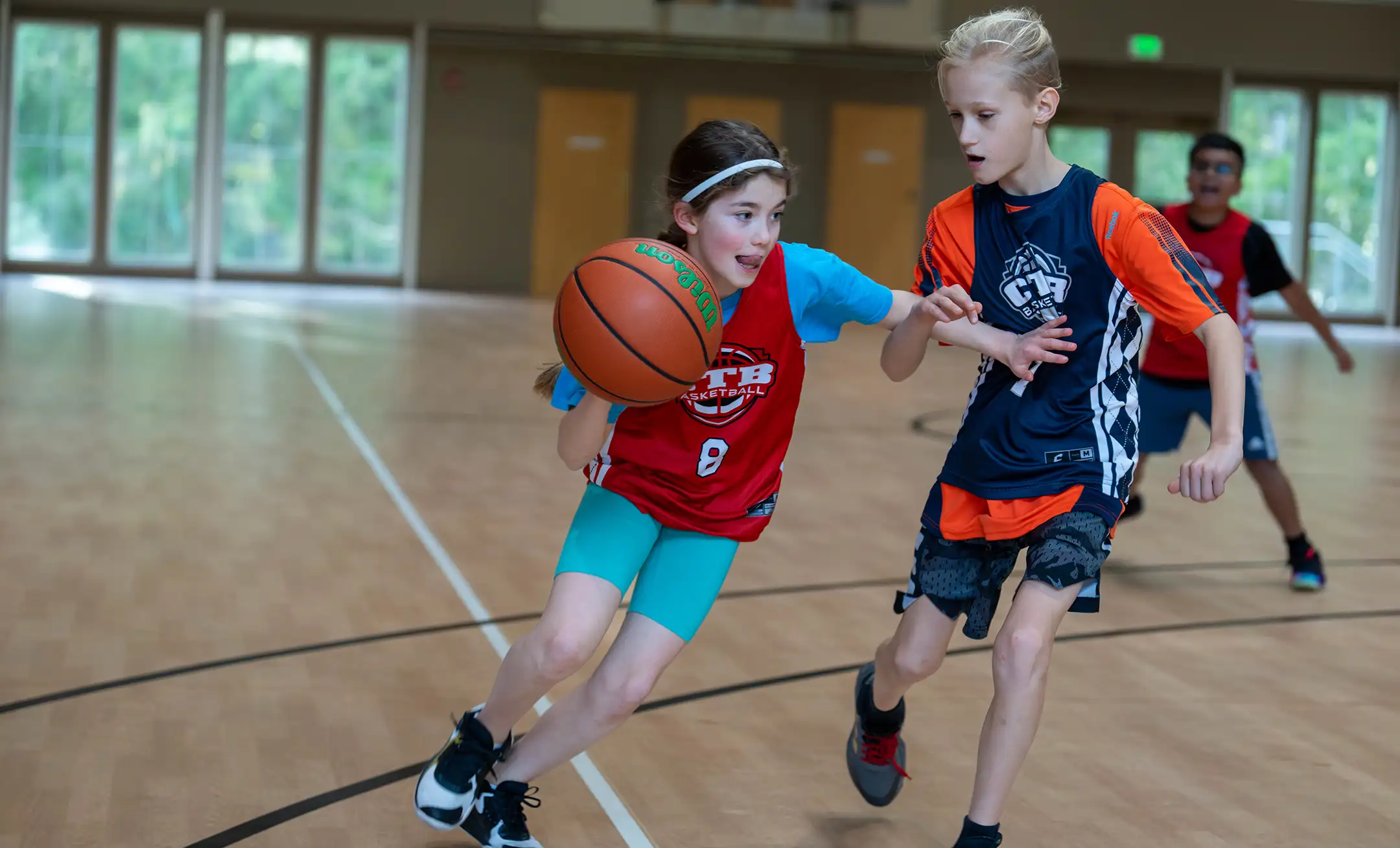 A boy playing basketball