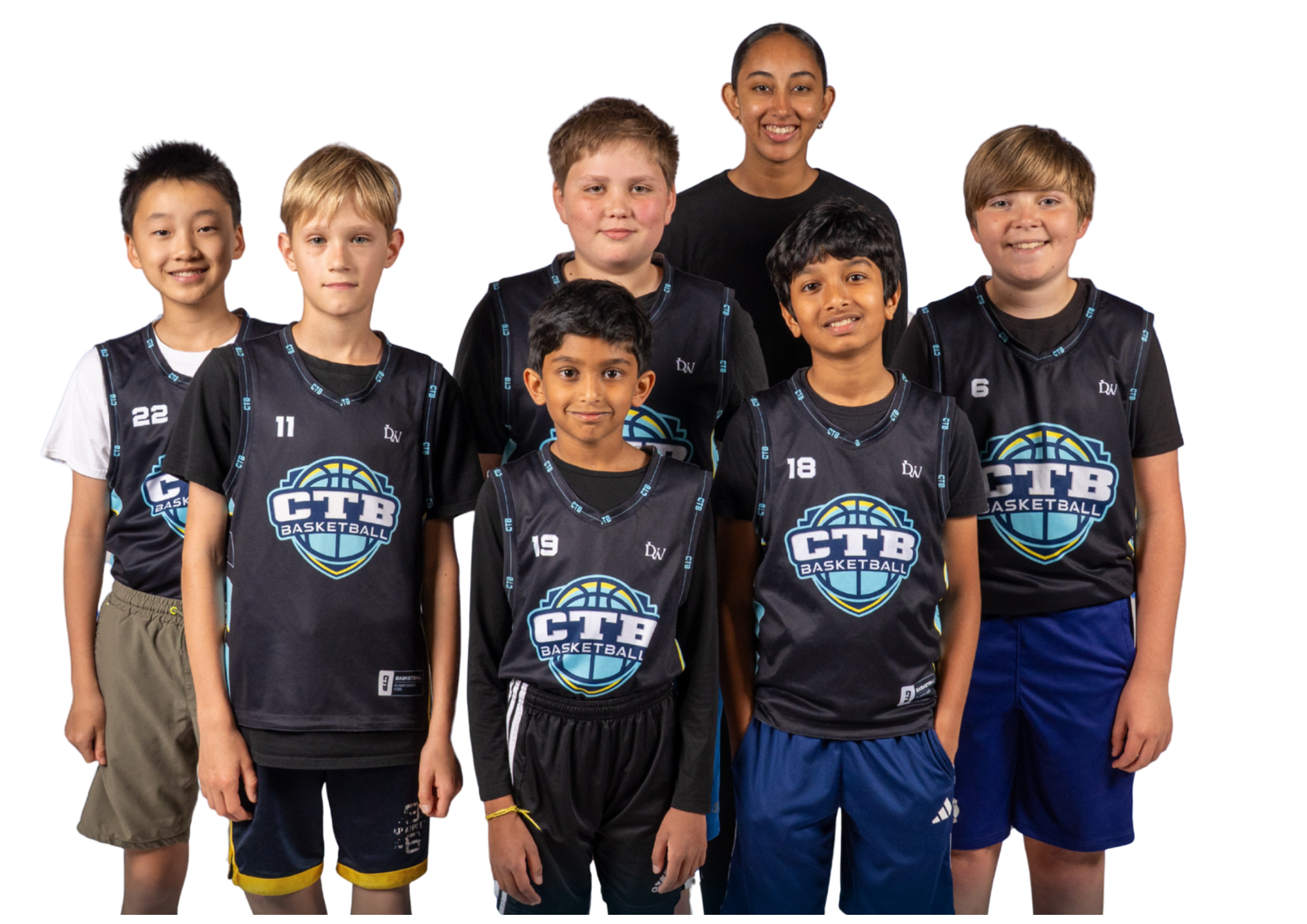 A basketball player dribbling in a game with the referee in the background